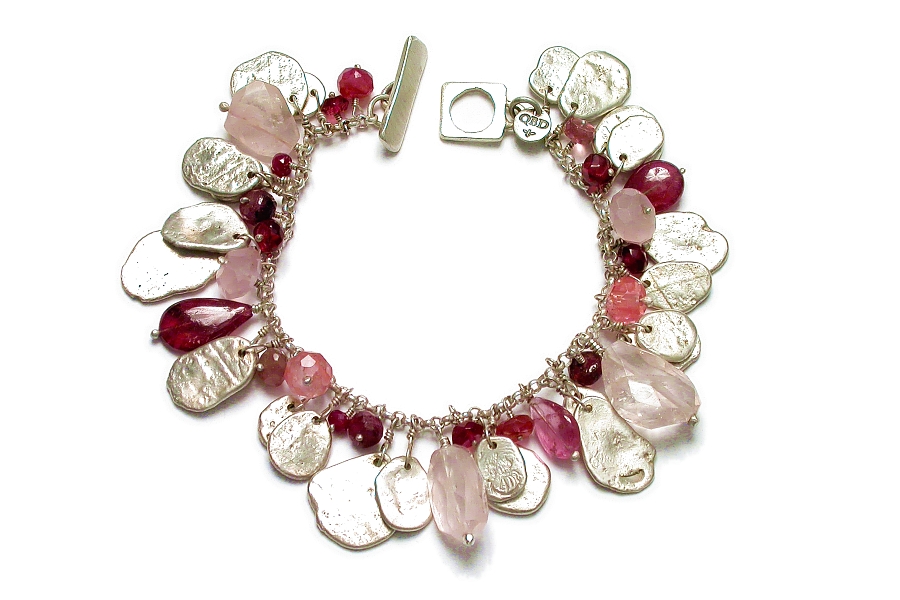mixed pinks & silver disc charm bracelet   $340.00   item 03-041 