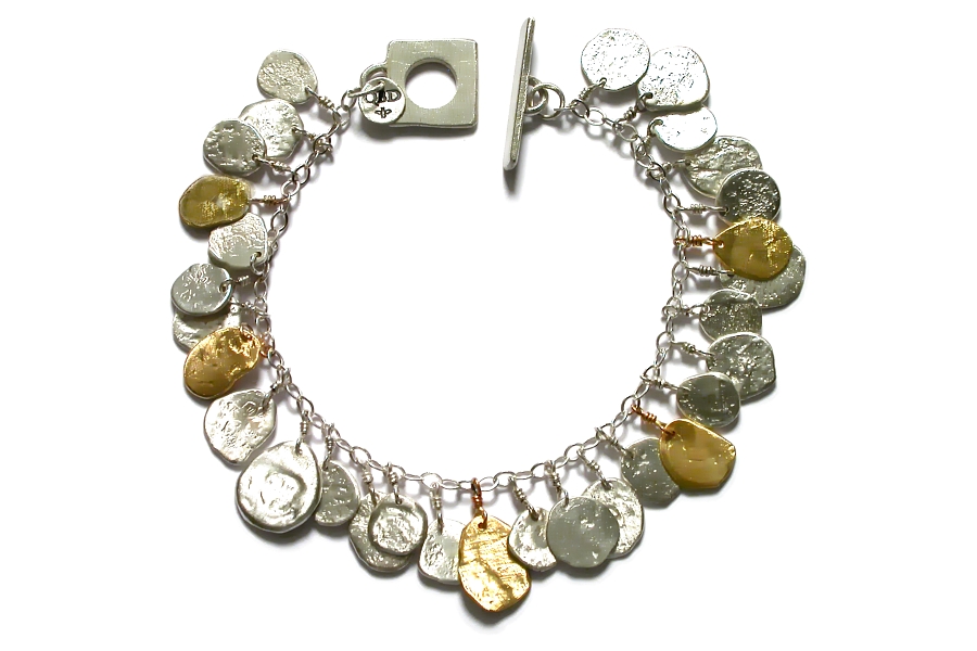 gold & silver disc charm bracelet   $460.00   item 04-400 