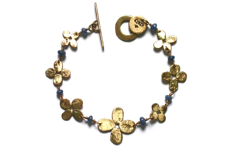 gold bloom and sapphire bracelet   $595.00   item 04-489 