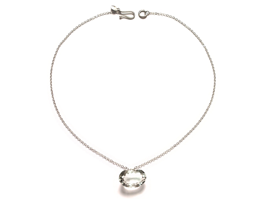 oval rock crystal faceted pendant on silver chain   $110.00   item 06-241 