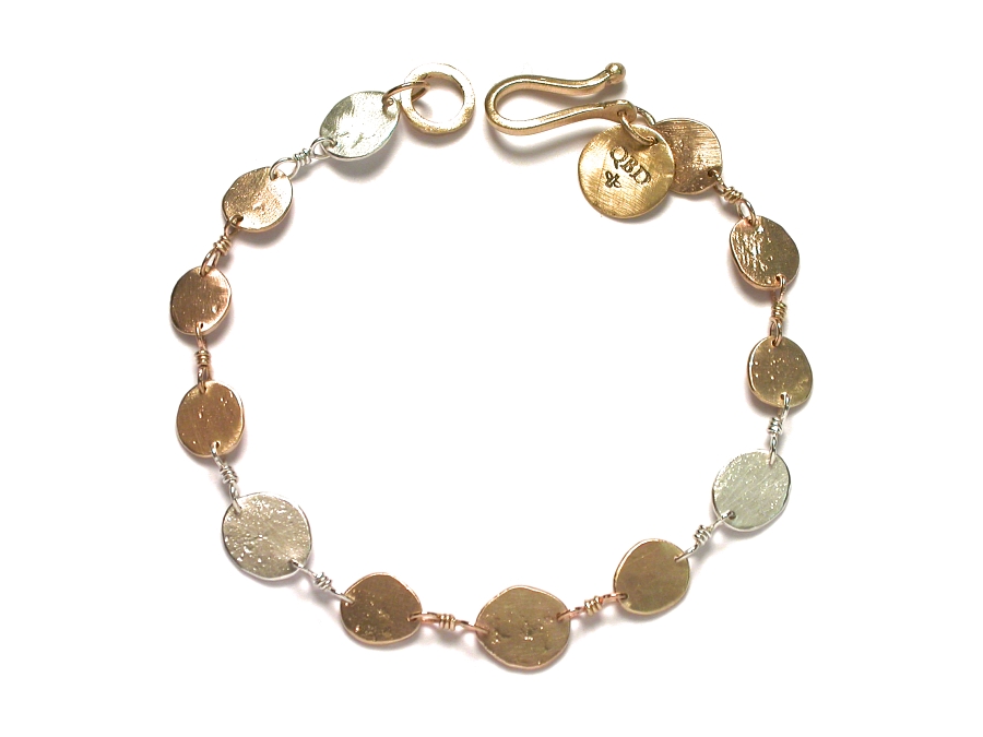 gold & silver mini-disc bracelet   $440.00   item 07-225 