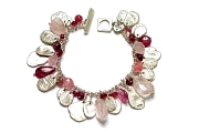mixed pinks & silver disc charm bracelet   $340.00   item 03-041 