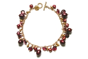 reds & golds dangle bracelet   $220.00   item 04-043 