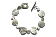 silver disc & mini-disc bracelet   $160.00   item 04-190 