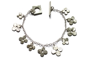 silver bloom charm bracelet   $250.00   item 04-464 