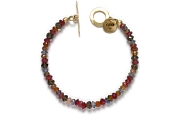 garnet, iolite, smoky quartz, andalusite & tourmaline bracelet   $165.00   item 06-131 
