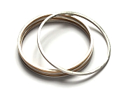 bangles - silver ($95 each) and silver with gold plated edges ($110 each)   $110.00   item 10-131 